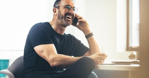 Magna Med Man at phone
